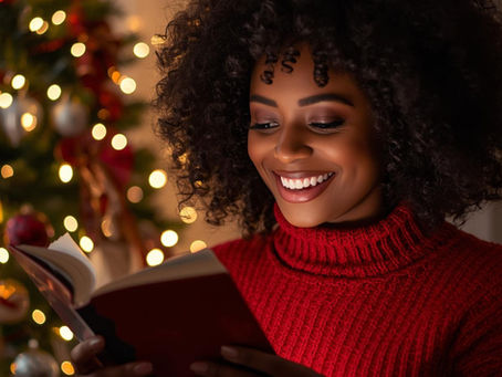 A Woman reading at Christmas Time