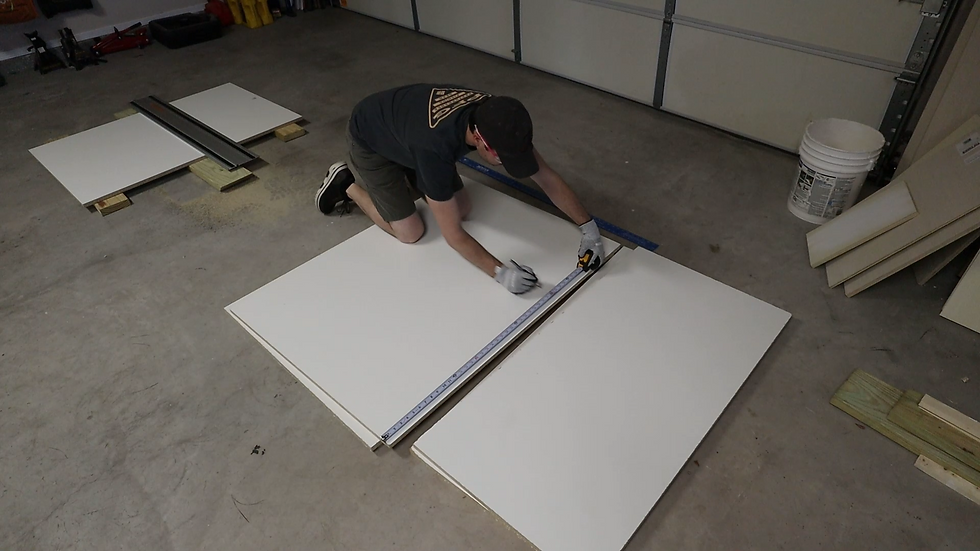 Measuring the melamine for the litter box cabinet