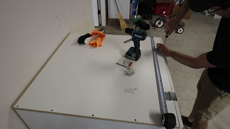 installing the door to the litter box cabinet