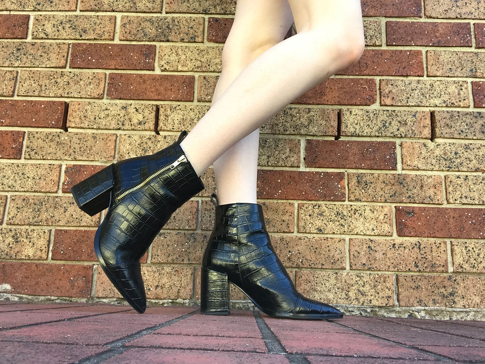 Same style as the Black Luxe only in Croc. Limited edition and no longer sold.