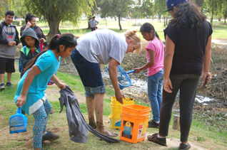 Children save fish at park