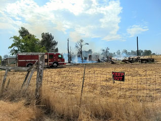 Fire razes house north of city