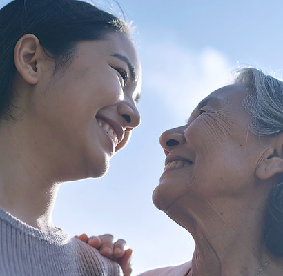 Firefly_a realistic stock photo of filipino old Mom with 20 year old daugher looking at e