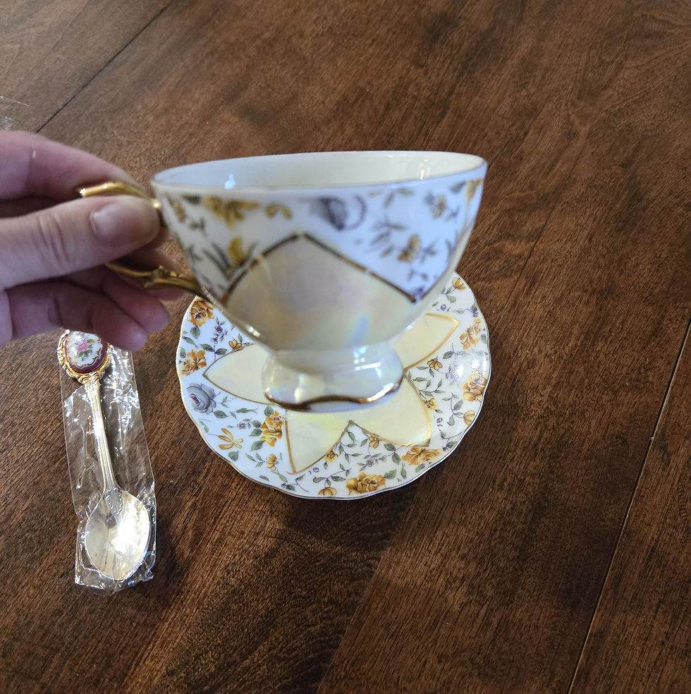 Thumbnail: Teacup & Saucer Set | Yellow Floral Pattern | Chrome Like Design