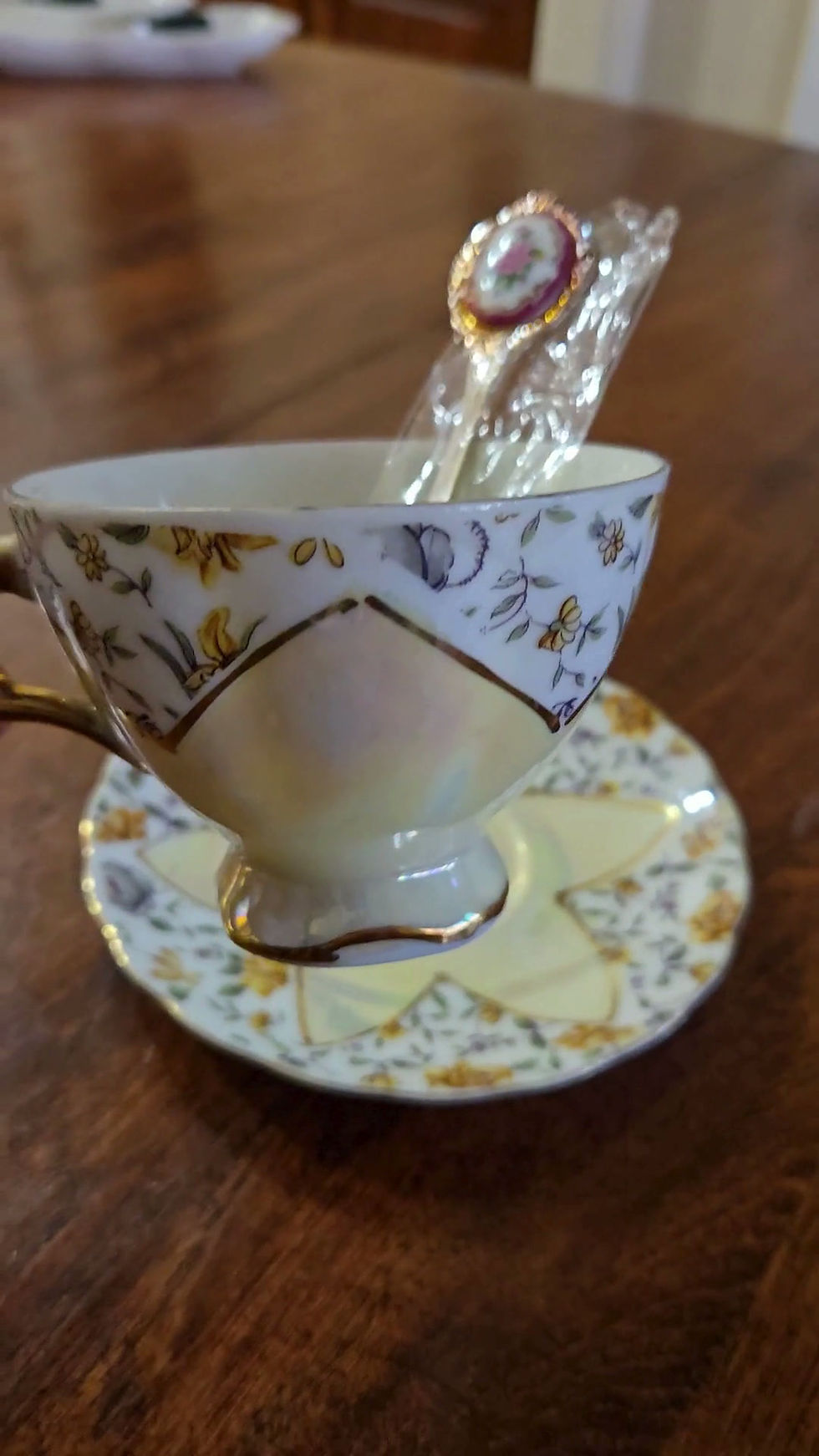 Thumbnail: Teacup & Saucer Set | Yellow Floral Pattern | Chrome Like Design