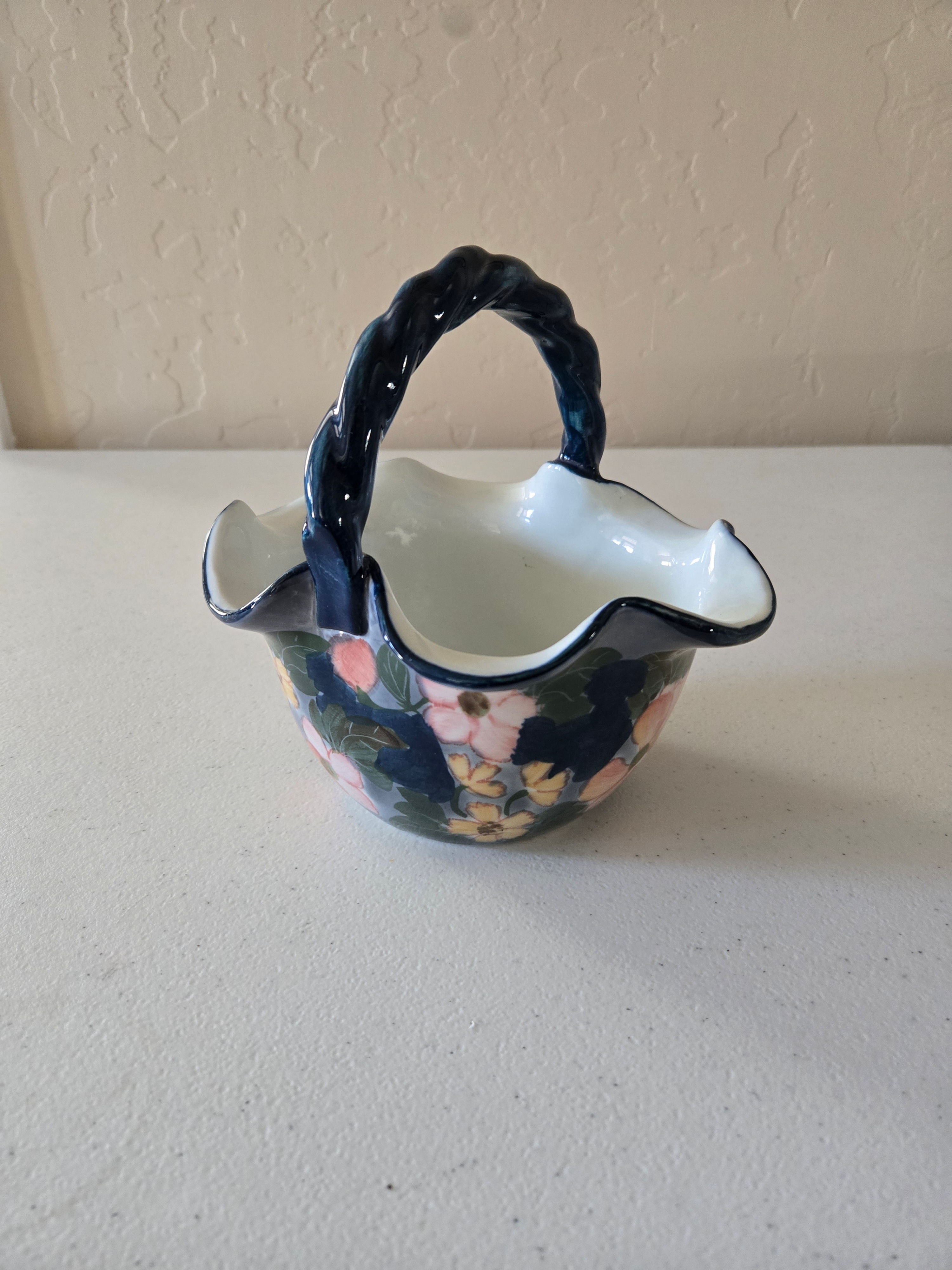 Ruffled Ceramic Basket with Floral Design & Twisted Style Handle
