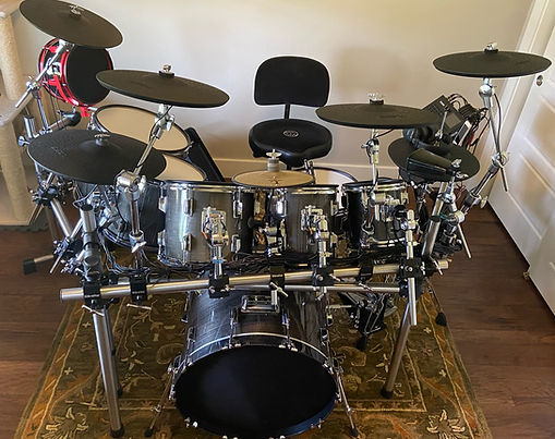 8-piece acoustic-to-electonic UFODrums eBridge conversion with Alesis Strike Pro & Roland TD-6 modules & cymbals.  Stainless steel drum rack by UFODrums with Yamaha cymbal and Gibraltar rack hardware.  Pearl pedals, hi-hat stand, Roc-Soc throne and Simmons DA200SB drum amp.