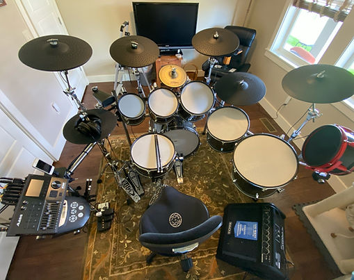 8-piece acoustic-to-electonic UFODrums eBridge conversion with Alesis Strike Pro & Roland TD-6 modules & cymbals.  Stainless steel drum rack by UFODrums with Yamaha cymbal and Gibraltar rack hardware.  Pearl pedals, hi-hat stand, Roc-Soc throne and Simmons DA200SB drum amp.