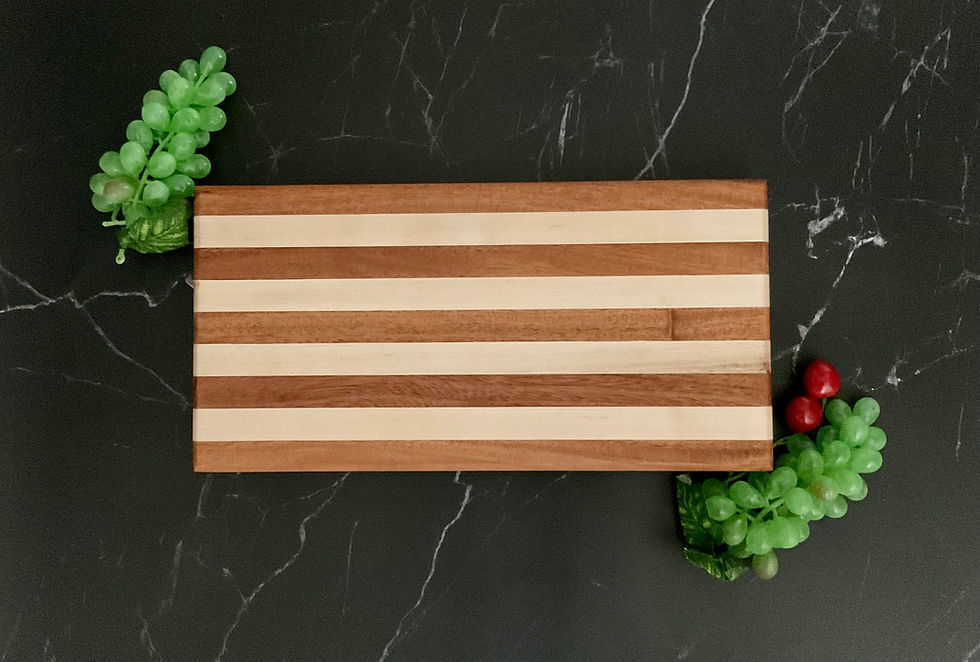 15.5x7.75x1.25 sapele and maple wood handmade cutting board