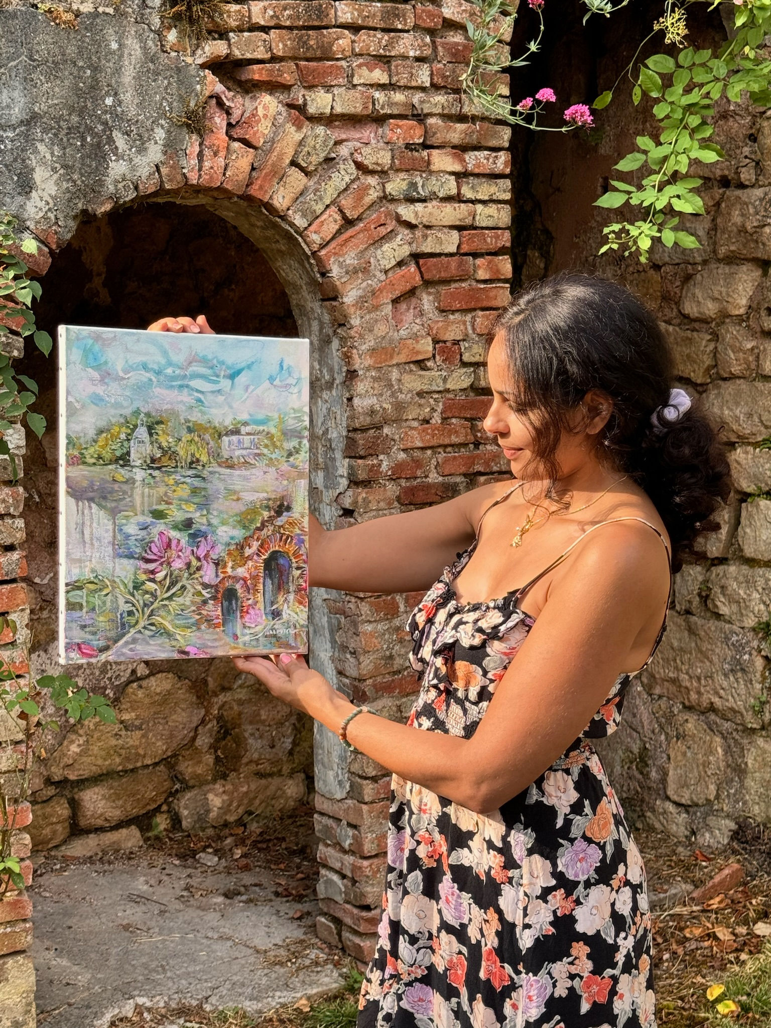 the artist holding the painting - Cottage Core style home decor