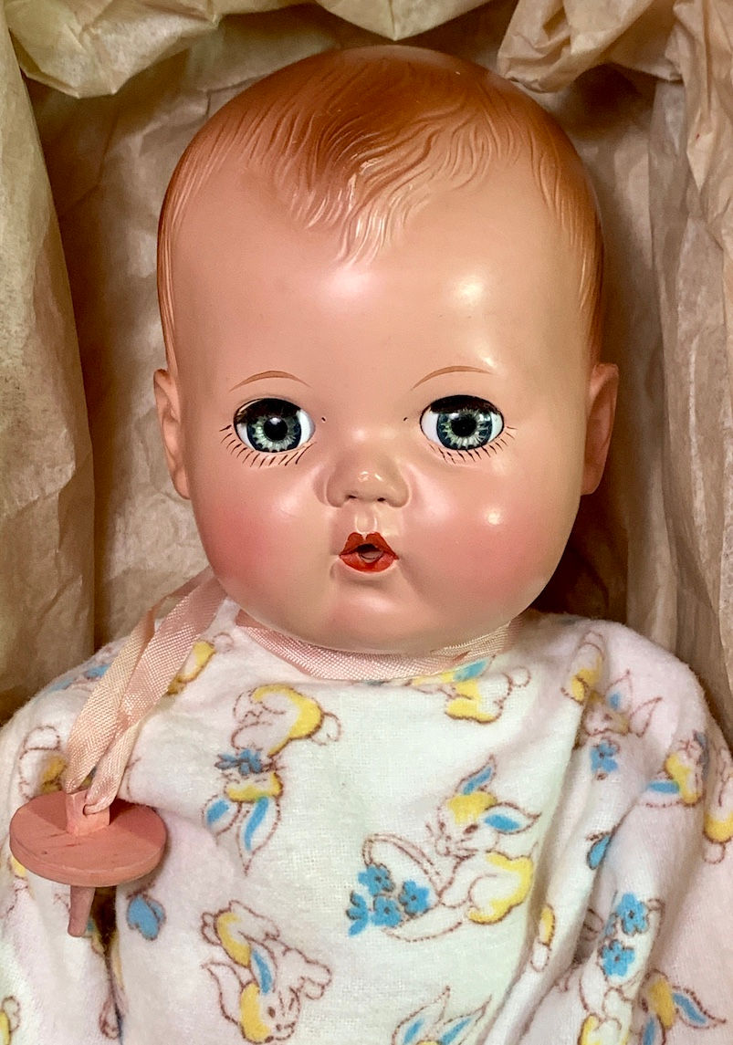 Thumbnail: Close-up front view of early 1950's Tiny Tears 11" rubber doll face