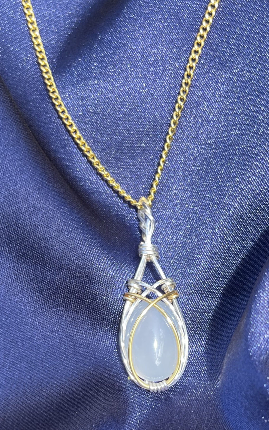 silver ad gold wire wrapped quartz cabochon necklace.