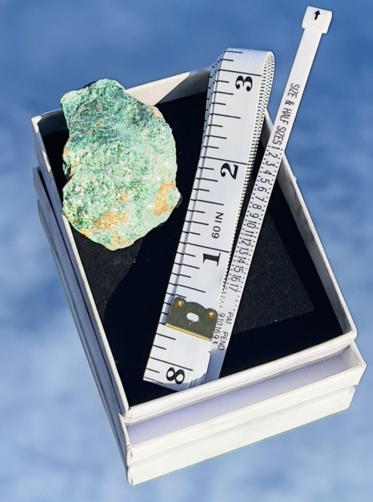 measuring tape, rings sizer and crystal gemstone