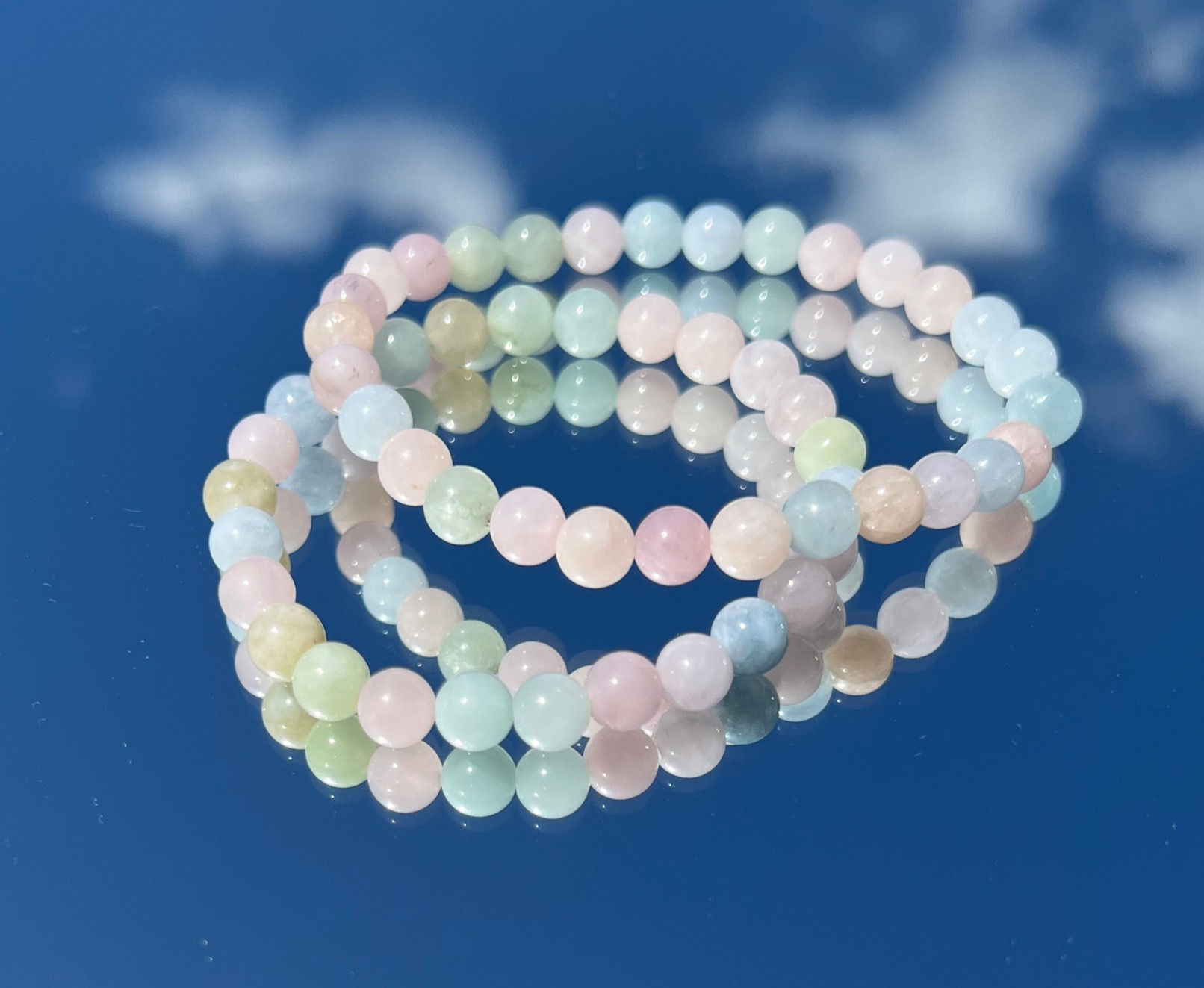 pink, blue, and green moonstone bracelet.