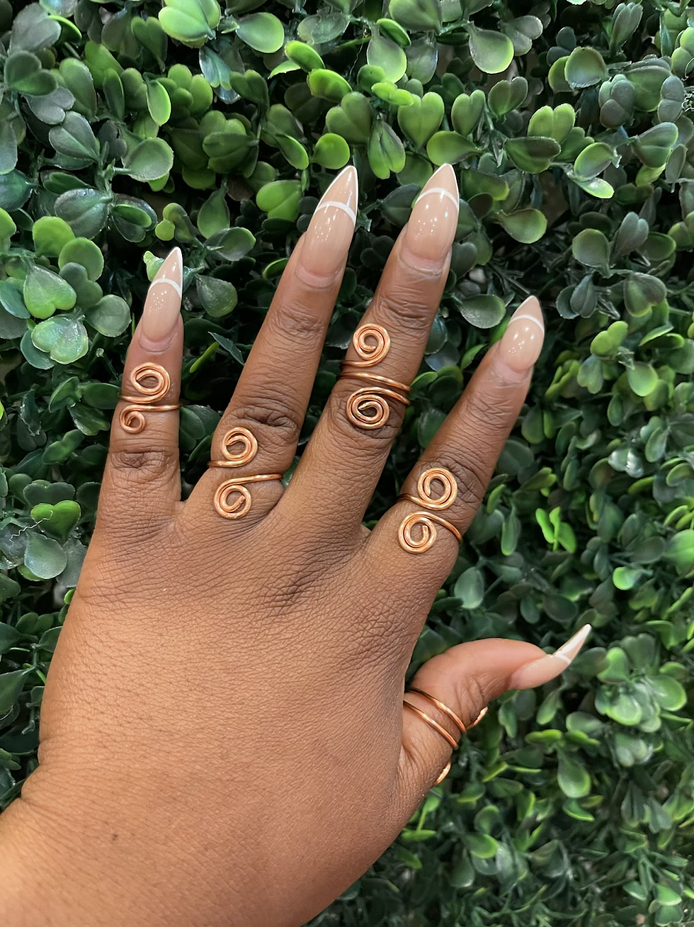 copper wire wrapped swirl ring.