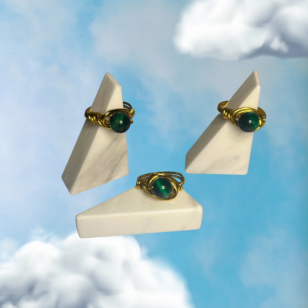 gold wire wrapped green tiger's eye rings.