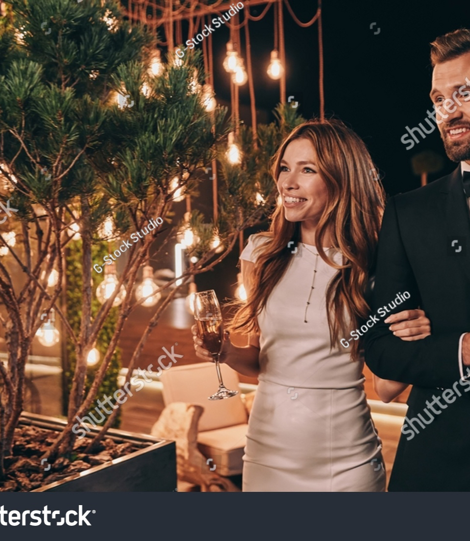 stock-photo-beautiful-young-couple-in-formalwear-spending-time-on-night-party-2039784587_e