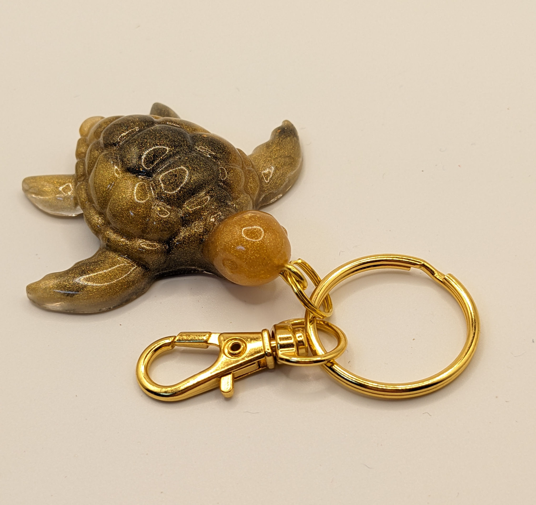black and gold turtle keychain