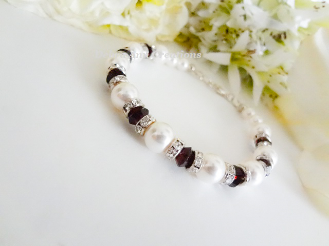 Thumbnail: Pearl and garnet crystal bicone clasp bracelet