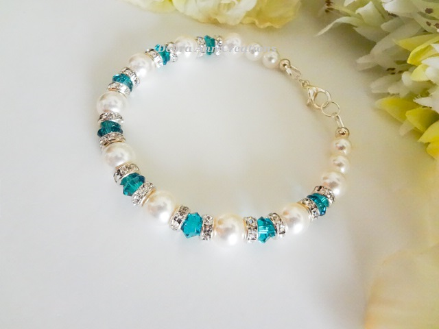 Thumbnail: December birthstone clasp bracelet with pearls and blue zircon crystals
