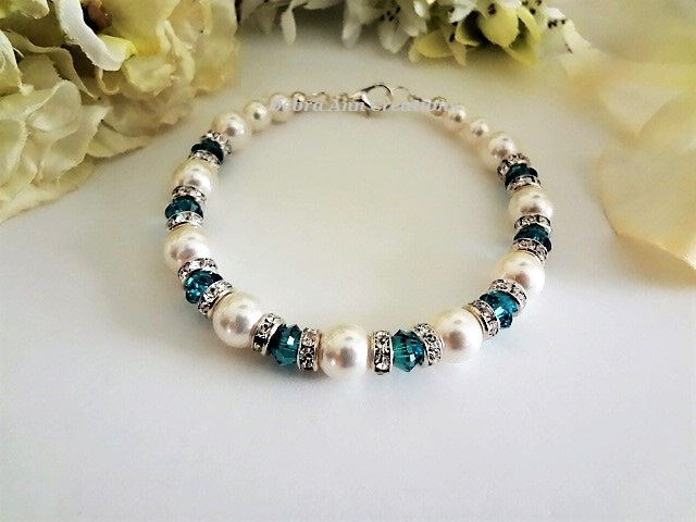 Thumbnail: December birthstone clasp bracelet with pearls and blue zircon crystals
