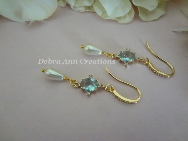 Thumbnail: Light Blue Oval Crystal and Teardrop Pearl Dangle Wedding Earrings