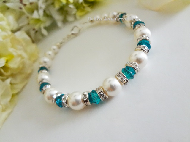Thumbnail: December birthstone clasp bracelet with pearls and blue zircon crystals