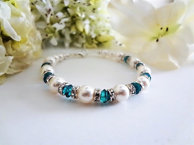Thumbnail: December birthstone clasp bracelet with pearls and blue zircon crystals