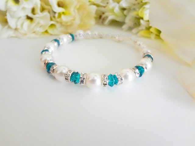 Thumbnail: December birthstone clasp bracelet with pearls and blue zircon crystals