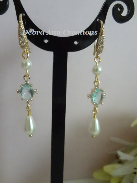 Thumbnail: Light Blue Oval CZ Crystal and Pearl Teardrop Dangle Earrings