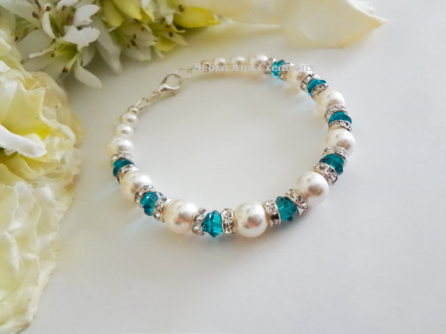 Thumbnail: December birthstone clasp bracelet with pearls and blue zircon crystals