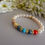 Thumbnail: Mothers Pearl Stretch Birthstone Bracelet MBR9010