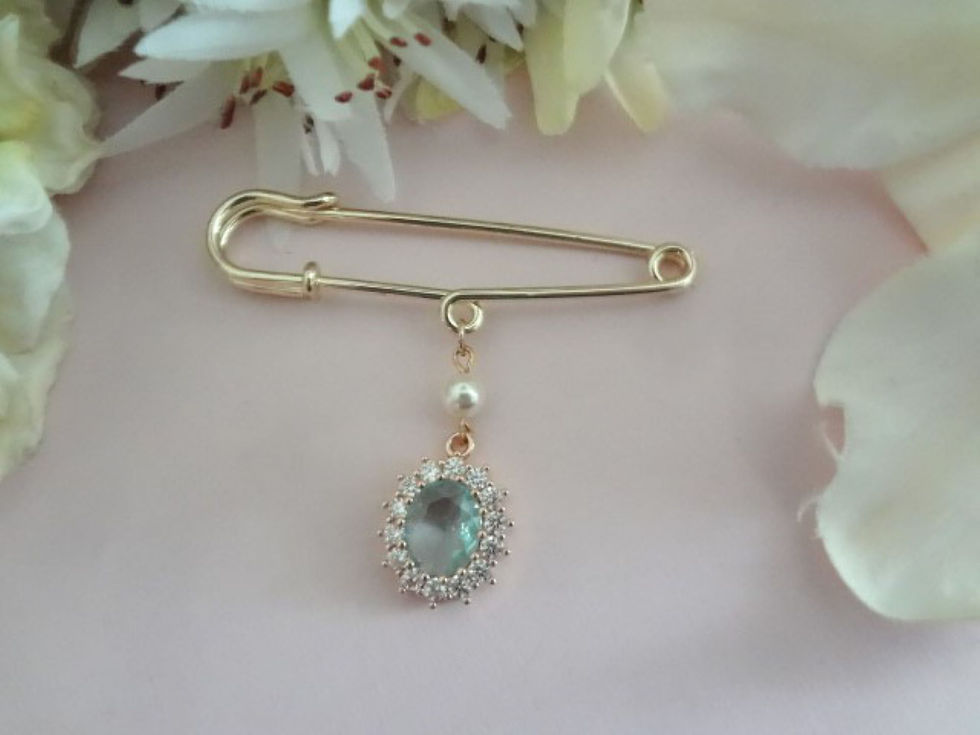Thumbnail: Gold Bouquet Safety Pin with a Small Round Pearl and a Light Blue Oval Crystal Surround by Small CZ Clear Stones Dangle