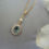Thumbnail: Light Blue Oval Crystal and Round Pearl Drop Gold Necklace