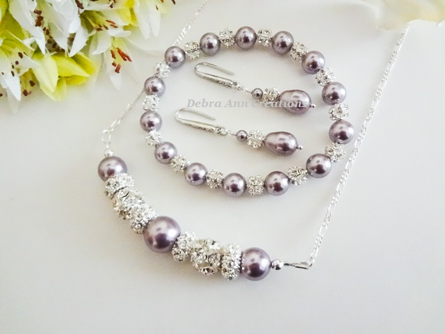Thumbnail: Pearl and Crystal Wedding Bracelet and Earrings Set BRSTPL2011