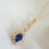 Thumbnail: Sold Out! Gold and Sapphire CZ Baguette Necklace and Earrings Set BRNKST5016