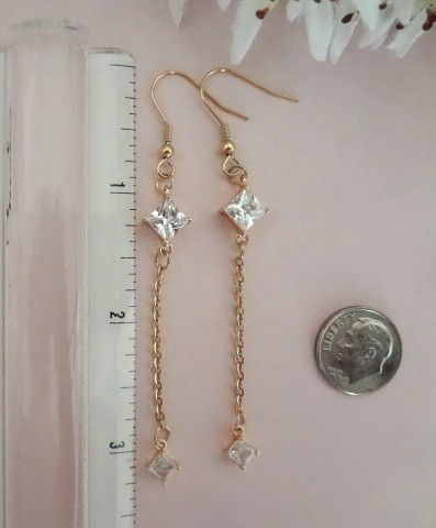 Thumbnail: Long Diamond Shape CZ Chain Earrings in Gold Finish Sizing Pic