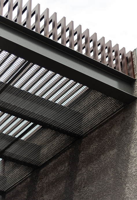 Detailed view of the roof design at One Surin, featuring sleek lines and sunshading fins for a modern aesthetic.