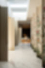 Bukit Tunggal house featuring a hallway with swivel doors and Chinese wallpaper