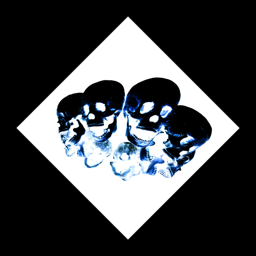 Diagonal Art Neg Skull Ring