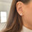 Thumbnail: Round cut moissanite stud earrings