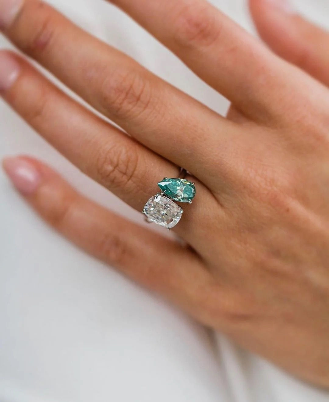 Moi Et Toi - Fancy blue old mine pear cut with cushion cut moissanite