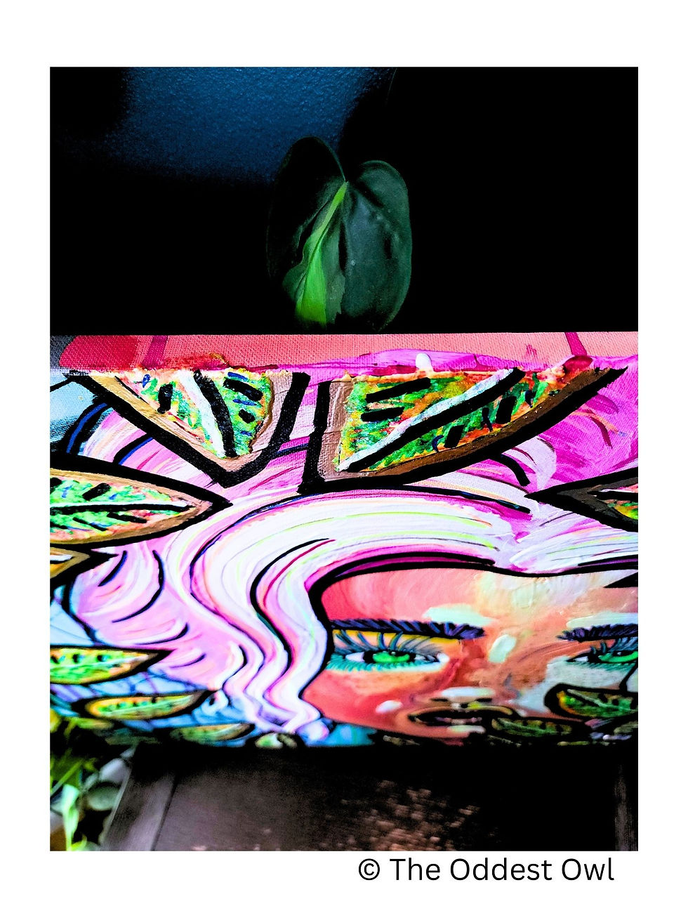 Thumbnail: Briella with pink hair hiding behind two vines, mysterious eyes, and full lips, set against a blue background.