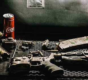 Automatic rifle & Coca-Cola can_edited.j