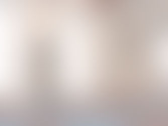 Eye-level view of a bright and airy fitness studio in Edinburgh with yoga mats neatly arranged