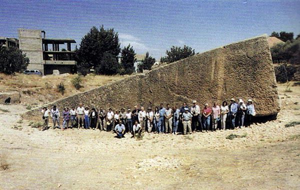 Zecharia Sitchin and his friends gather before the "stone of the South" in its quarry.