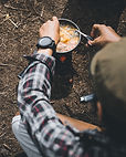 Camper Preparing Meal
