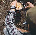 Camper Preparing Meal