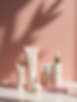 A close-up shot of beautifully packaged intimate wellness products with elegant branding,