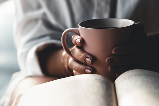 woman-with-coffee-and-book-relaxing-at-home-2026-03-13-01-35-47-utc (1).JPG